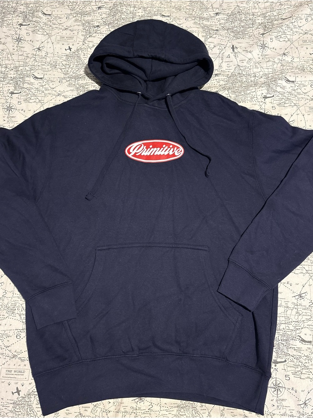 Primitive Navy Hoodie with Red Oval Logo